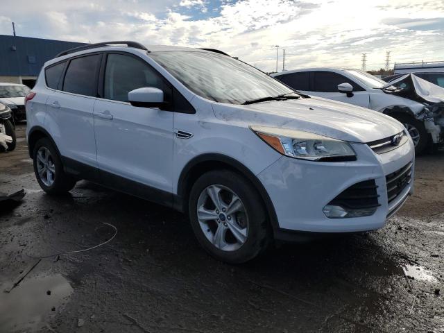 Foto 4 de la subasta – 2014 FORD ESCAPE SE con VIN 1FMCU9GX2EUD76901