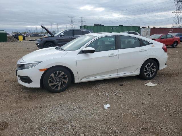 HONDA CIVIC EX 2018 with VIN 19XFC2F72JE021197 - Photo from auction
