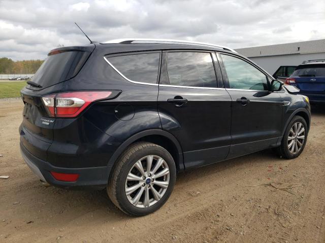 Photo 3 from auction – 2017 FORD ESCAPE TITANIUM with VIN 1FMCU0J90HUB91143
