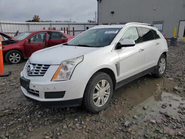 CADILLAC SRX LUXURY 2014 with VIN 3GYFNEE39ES599731 - Photo from auction
