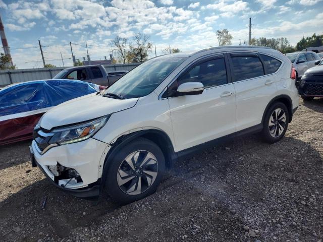 HONDA CR-V TOURI 2015 with VIN 5J6RM4H97FL063619 - Photo from auction
