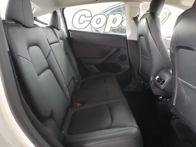 Photo 10 from auction – 2023 TESLA MODEL Y with VIN 7SAYGDEEXPF619004