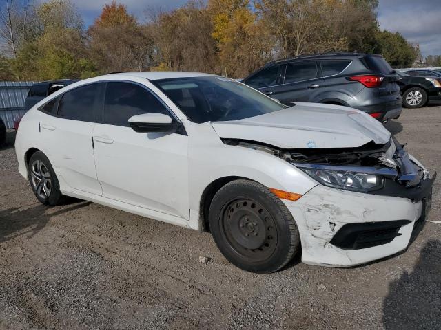 Photo 4 from auction – 2017 HONDA CIVIC LX with VIN 2HGFC2F58HH032588