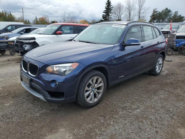 BMW X1 XDRIVE2 2014 with VIN WBAVL1C55EVY18969 - Photo from auction