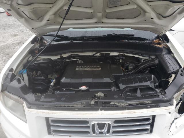 Photo 11 from auction – 2006 HONDA RIDGELINE with VIN 2HJYK16596H521207