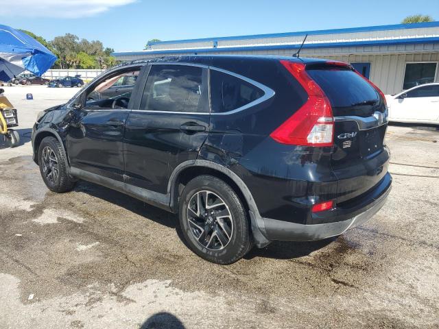 Photo 2 from auction – 2016 HONDA CR-V with VIN 2HKRM3H47GH530869