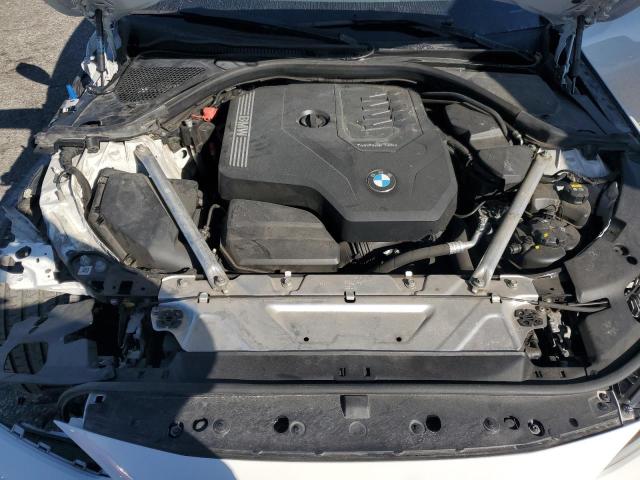 Photo 11 from auction – 2022 BMW 430I with VIN WBA53AP0XNCJ76940