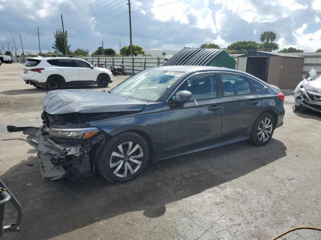 HONDA CIVIC LX 2023 with VIN 2HGFE2F25PH569269 - Photo from auction