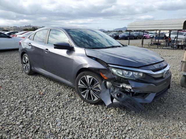 Photo 4 from auction – 2018 HONDA CIVIC EX with VIN 19XFC1F31JE201679