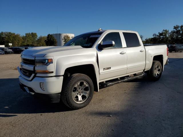 CHEVROLET SILVERADO 2018 with VIN 3GCUKREC5JG125978 - Photo from auction
