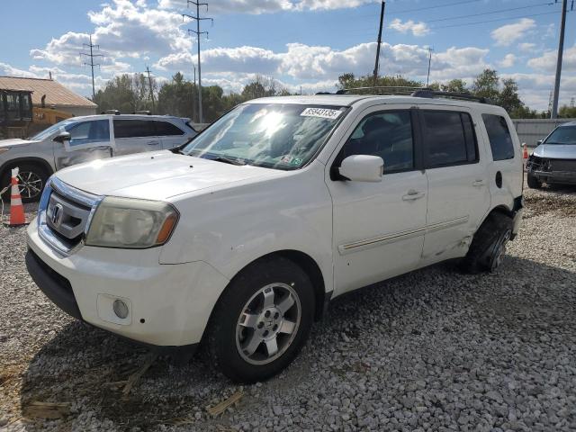 HONDA PILOT TOUR 2011 with VIN 5FNYF4H91BB030611 - Photo from auction