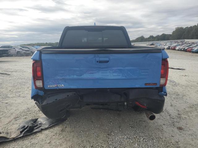 Photo 6 from auction – 2025 HONDA RIDGELINE with VIN 5FPYK3F66SB025281
