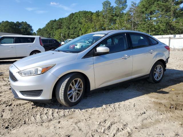 FORD FOCUS SE 2018 with VIN 1FADP3F21JL206621 - Photo from auction