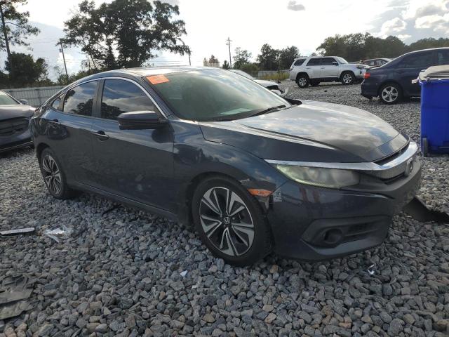 Photo 4 from auction – 2017 HONDA CIVIC EX with VIN 19XFC1F31HE005672