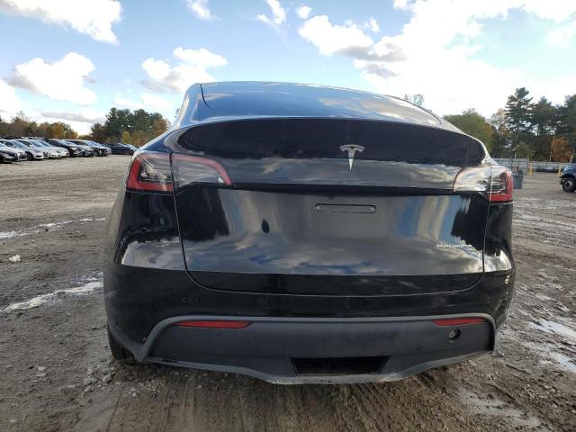Photo 6 from auction – 2025 TESLA MODEL Y with VIN 7SAYGDEE6SA351624