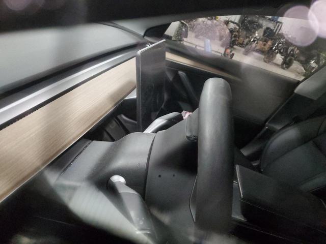 Photo 9 from auction – 2021 TESLA MODEL 3 with VIN 5YJ3E1EA7MF031551