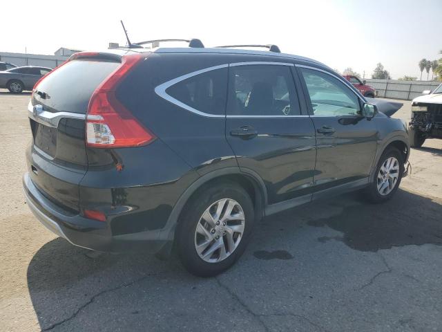 Photo 3 from auction – 2015 HONDA CR-V EXL with VIN 2HKRM3H79FH521180