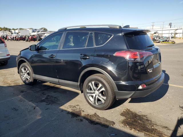 Photo 2 from auction – 2018 TOYOTA RAV4 LE with VIN 2T3ZFREV6JW498457