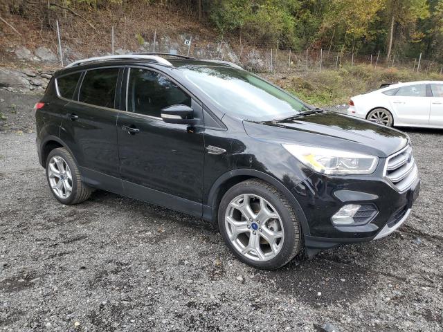 Photo 4 from auction – 2017 FORD ESCAPE TITANIUM with VIN 1FMCU0J90HUB64587