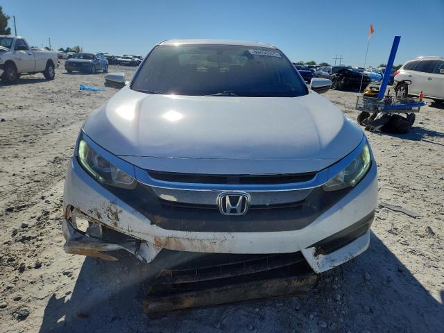 Photo 5 from auction – 2018 HONDA CIVIC with VIN 19XFC2F75JE038012