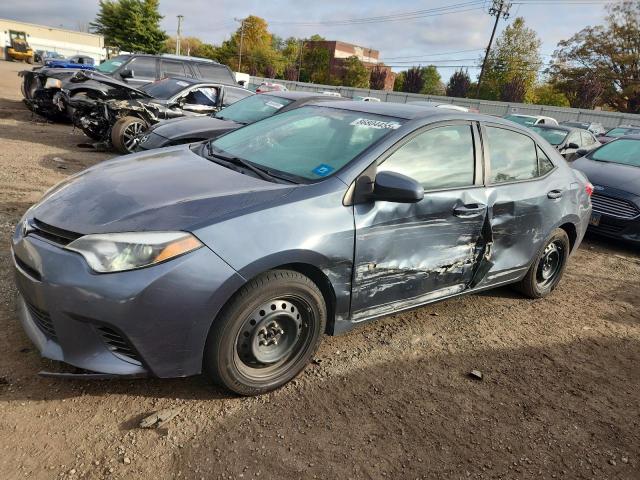 TOYOTA COROLLA L 2015 with VIN 2T1BURHE7FC321324 - Photo from auction