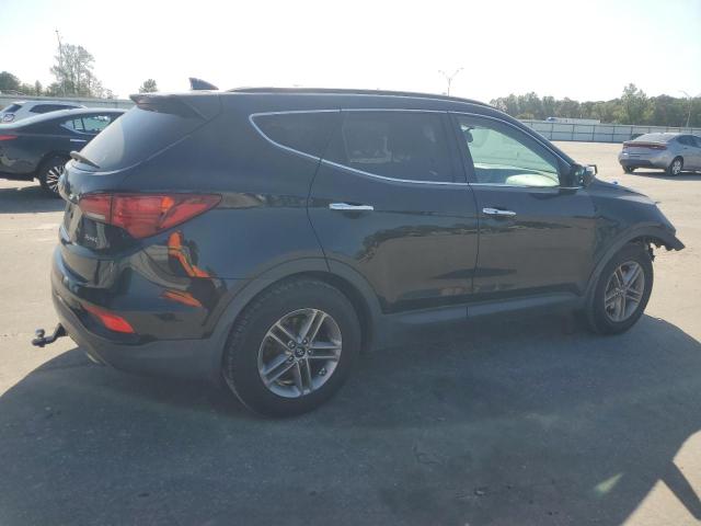 Photo 3 from auction – 2018 HYUNDAI SANTA FE S with VIN 5NMZU3LBXJH065336