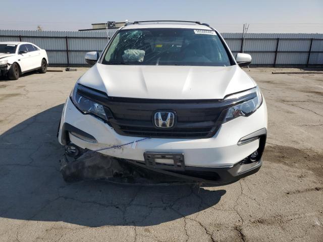 Photo 5 from auction – 2022 HONDA PILOT SE with VIN 5FNYF6H21NB093369