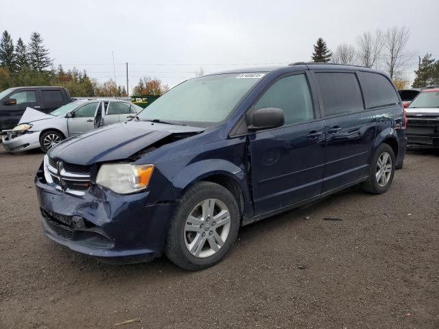 DODGE GRAND CARA 2014 with VIN 2C4RDGBGXER475957 - Photo from auction