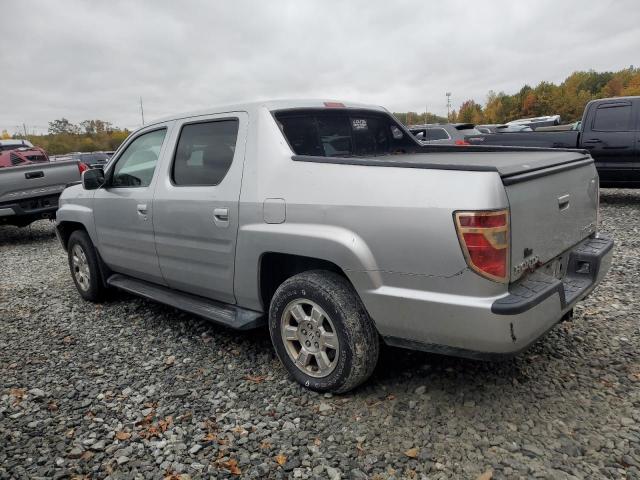 Photo 2 from auction – 2010 HONDA RIDGELINE with VIN 5FPYK1F40AB012172