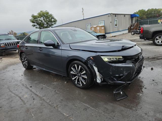 Photo 4 from auction – 2023 HONDA CIVIC EX with VIN 2HGFE1F74PH303425