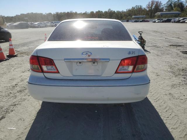 Photo 6 from auction – 2002 INFINITI I35 with VIN JNKDA31A52T026889