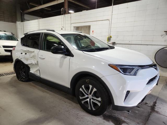 Photo 4 from auction – 2018 TOYOTA RAV4 LE with VIN JTMBFREV8JJ742528