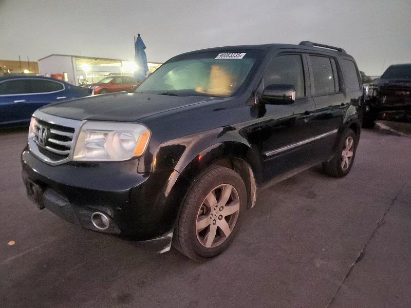 HONDA PILOT TOUR 2014 with VIN 5FNYF3H9XEB007701 - Photo from auction