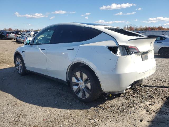 Photo 2 from auction – 2023 TESLA MODEL Y with VIN 7SAYGDEE0PF645885