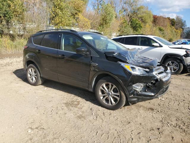 Photo 4 from auction – 2018 FORD ESCAPE SE with VIN 1FMCU9GD2JUD49780