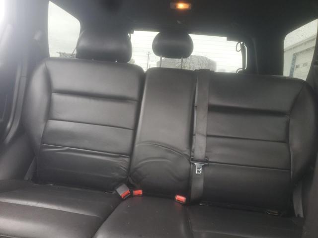 Photo 10 from auction – 2009 FORD ESCAPE LIM with VIN 1FMCU04719KB93930