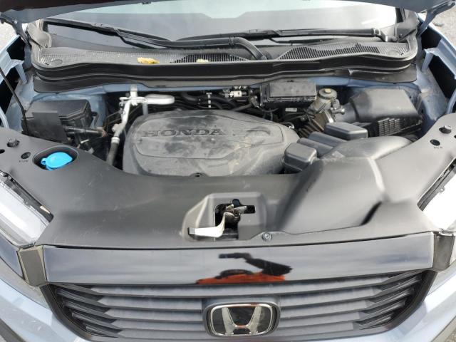 Photo 11 from auction – 2023 HONDA RIDGELINE with VIN 5FPYK3F58PB038547