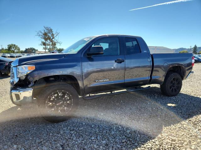 TOYOTA TUNDRA DOU 2014 with VIN 5TFUM5F16EX052444 - Photo from auction
