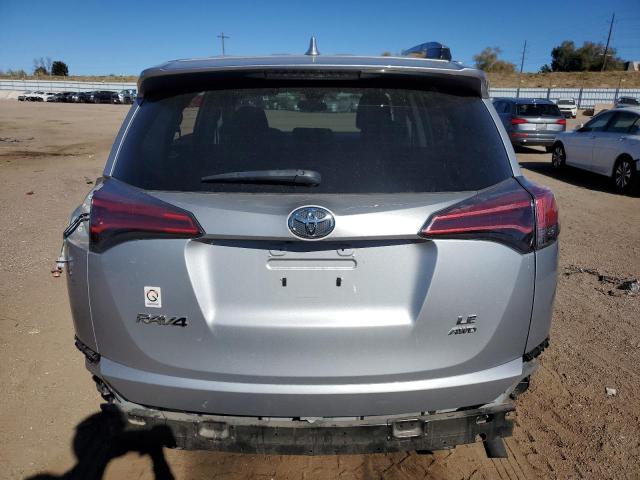 Photo 6 from auction – 2018 TOYOTA RAV4 LE with VIN 2T3BFREV7JW717735