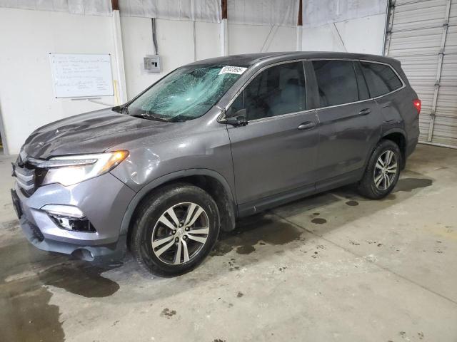 HONDA PILOT EX 2017 with VIN 5FNYF5H3XHB035039 - Photo from auction
