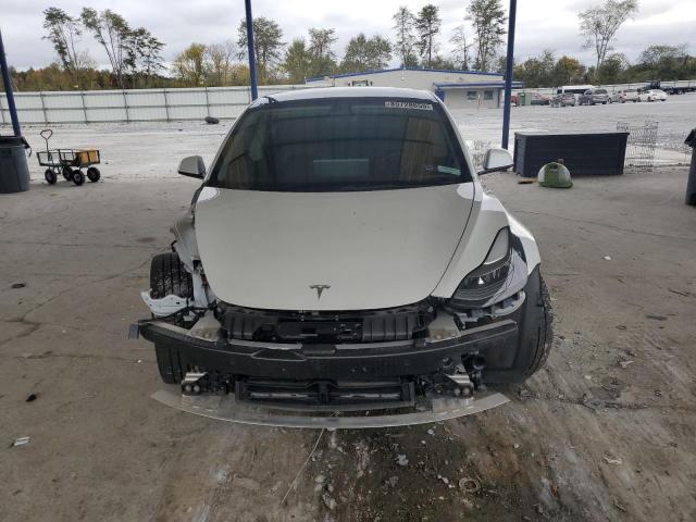 Photo 5 from auction – 2022 TESLA MODEL 3 with VIN 5YJ3E1EB9NF107457
