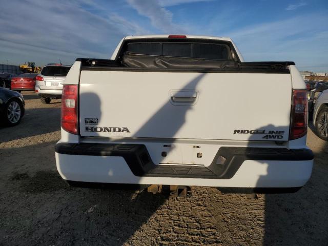Photo 6 from auction – 2011 HONDA RIDGELINE with VIN 5FPYK1F54BB501376