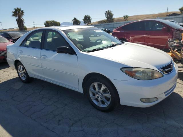 Photo 4 from auction – 2004 TOYOTA CAMRY LE with VIN JTDBE30KX40269724