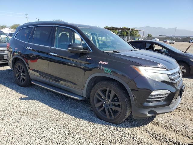 Photo 4 from auction – 2017 HONDA PILOT ELIT with VIN 5FNYF6H04HB055282