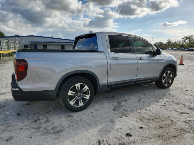 Photo 3 from auction – 2018 HONDA RIDGELINE with VIN 5FPYK2F50JB001798