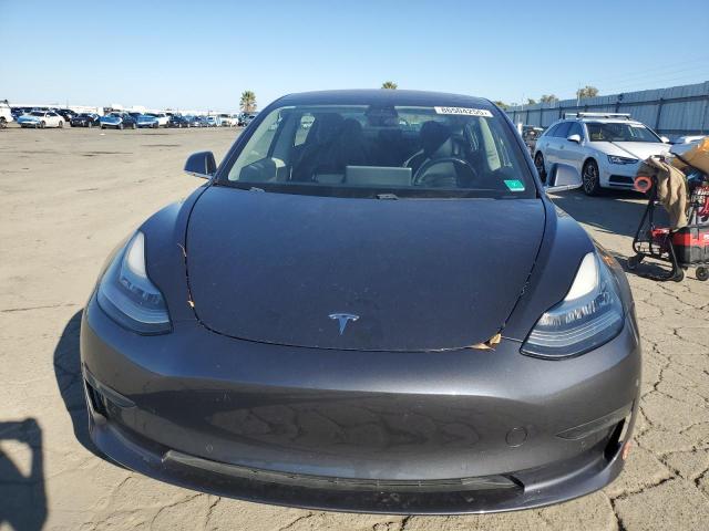 Photo 5 from auction – 2018 TESLA MODEL 3 with VIN 5YJ3E1EA1JF058689
