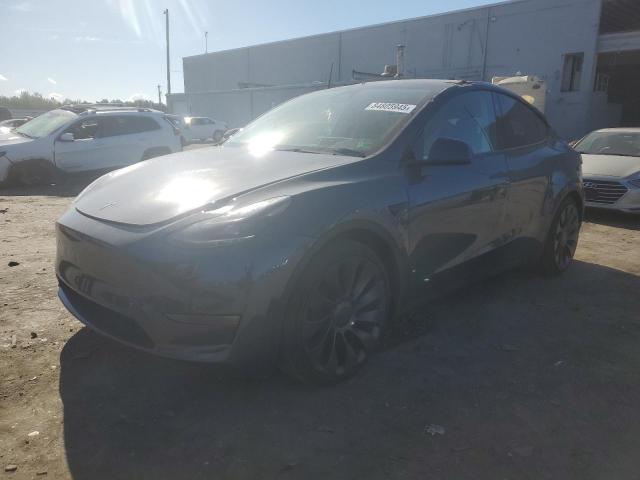 TESLA MODEL Y 2023 with VIN 7SAYGDEF4PF894702 - Photo from auction