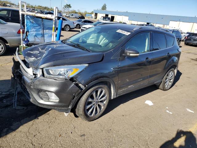 FORD ESCAPE TIT 2017 with VIN 1FMCU0J96HUB62410 - Photo from auction