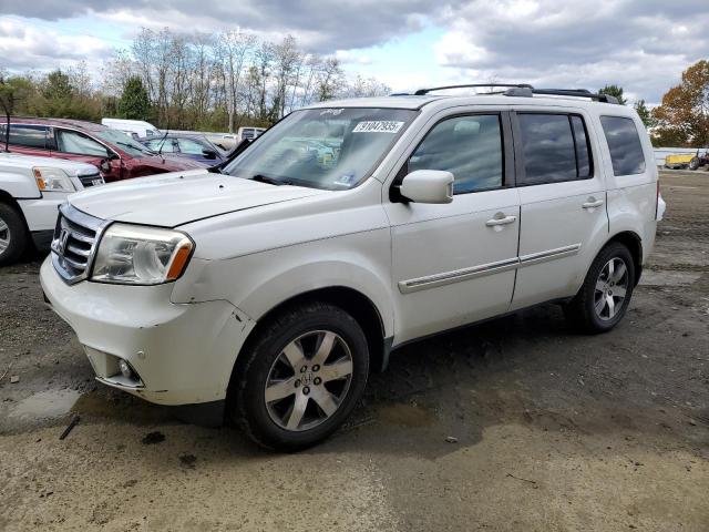 HONDA PILOT TOUR 2013 with VIN 5FNYF4H9XDB039388 - Photo from auction