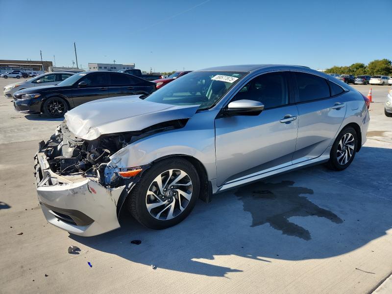 HONDA CIVIC 2018 with VIN 19XFC2F73JE034105 - Photo from auction